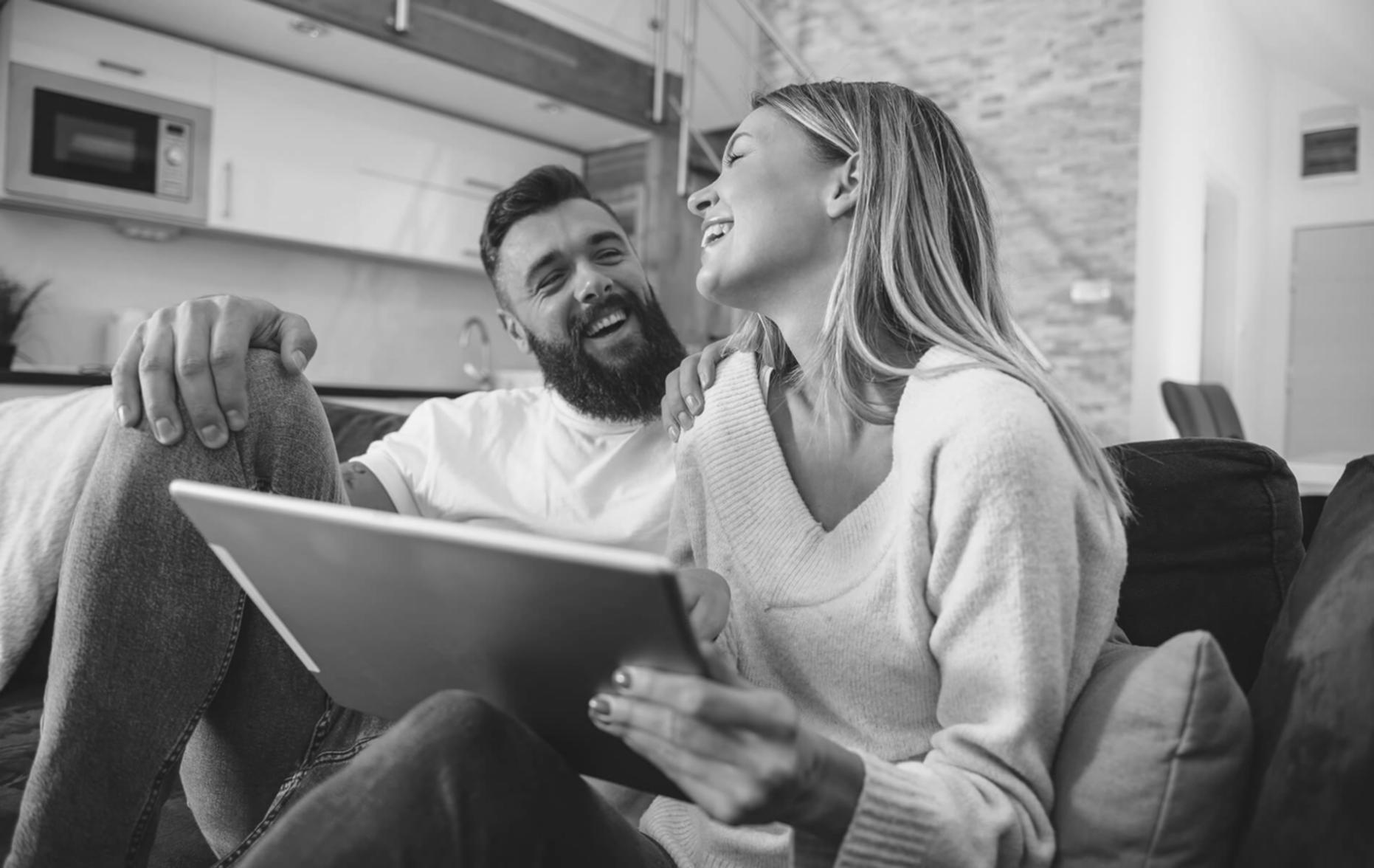 Person reviewing financial statements with calculator